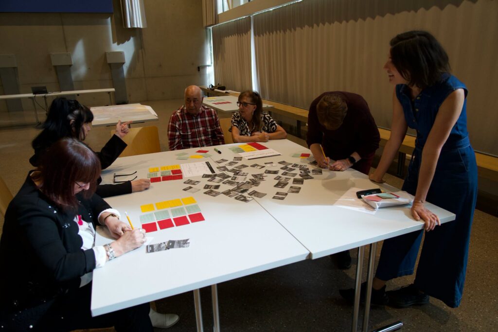 Workshop participants working on a table