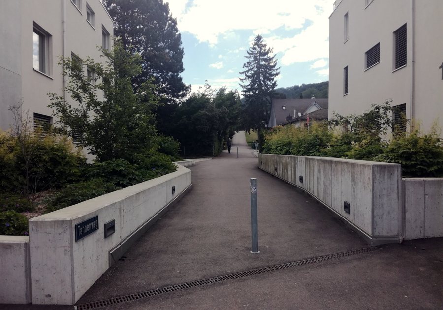 Ramp with handrails leading between buildings